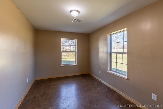 unfurnished room with plenty of natural light