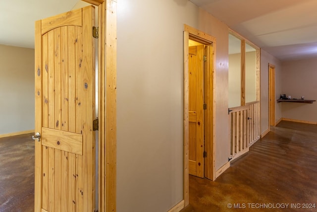 hall with dark hardwood / wood-style floors