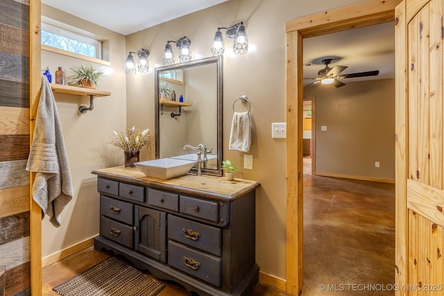 bathroom featuring concrete flooring, vanity, and ceiling fan