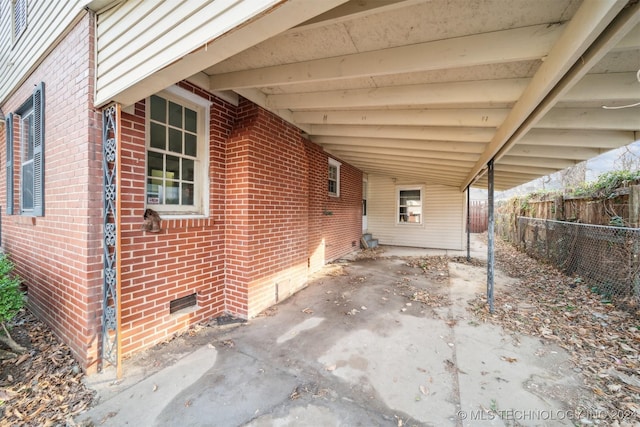 view of patio / terrace featuring a carport