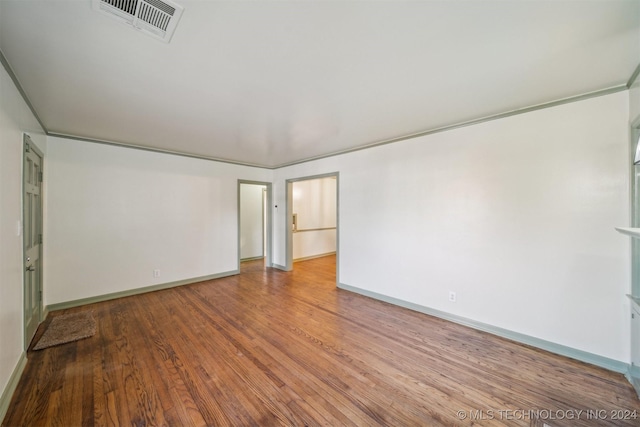 spare room with light hardwood / wood-style floors