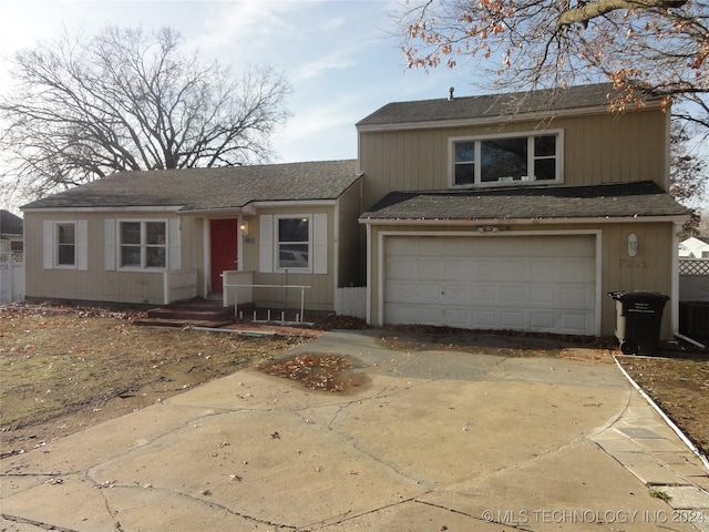 view of front of property with a garage