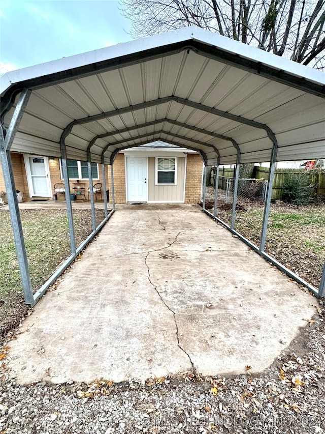 view of parking / parking lot with a carport