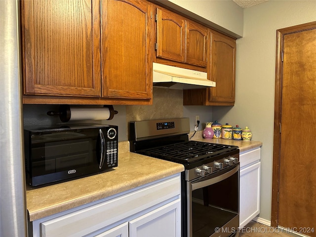 kitchen featuring stainless steel range with gas cooktop