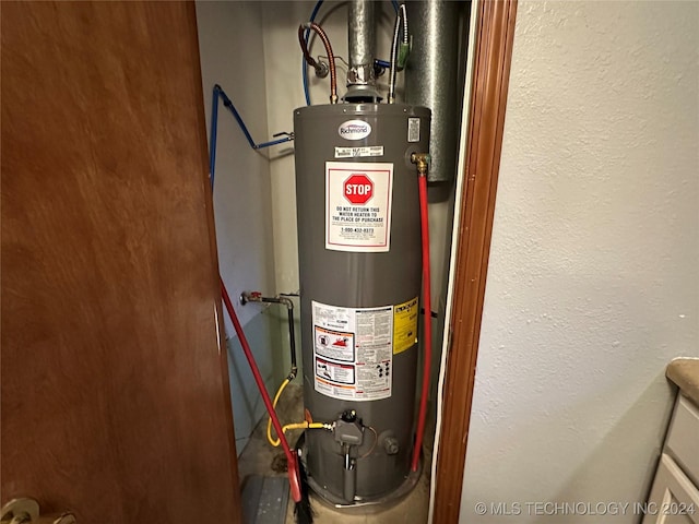 utility room with water heater