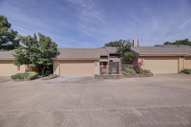 single story home with a garage