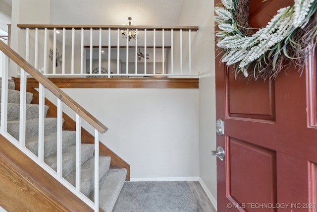 staircase with baseboards