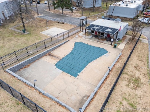 view of swimming pool with a yard and a patio