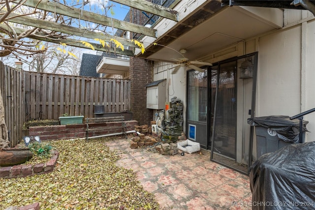 view of patio with a pergola and ceiling fan