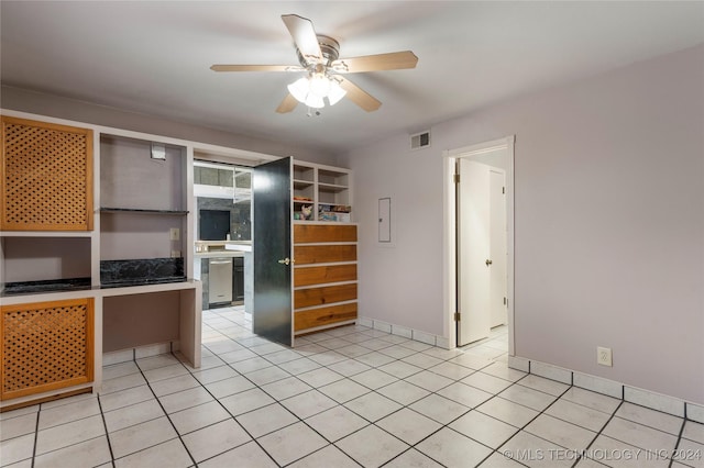 kitchen featuring ceiling fan, dishwasher, and light tile patterned flooring