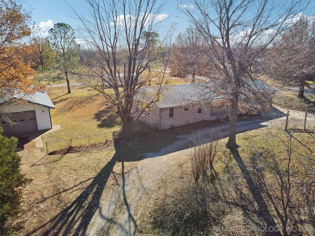 view of yard with a garage