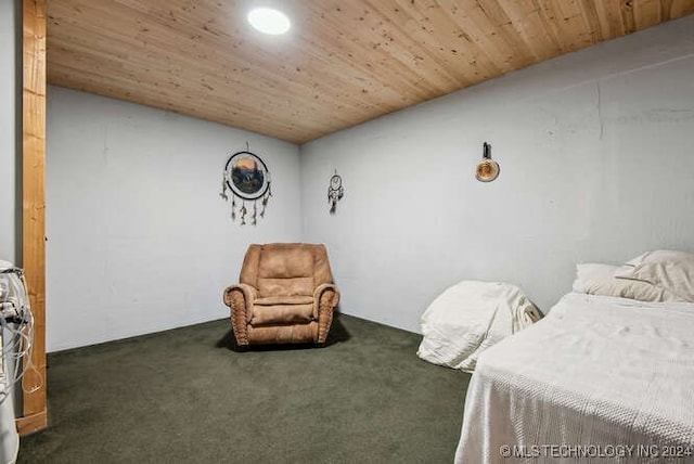 carpeted bedroom with wooden ceiling