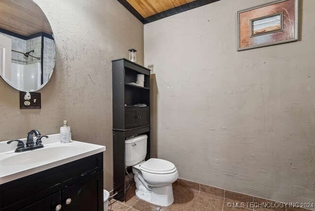 bathroom featuring vanity, toilet, lofted ceiling, and wood ceiling