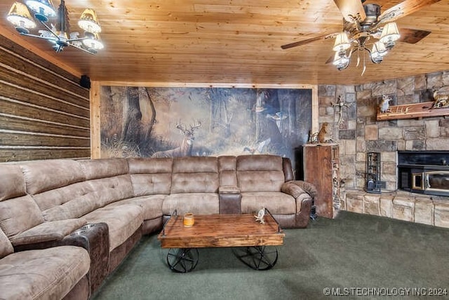 living room with carpet, ceiling fan, wooden ceiling, a wood stove, and wood walls