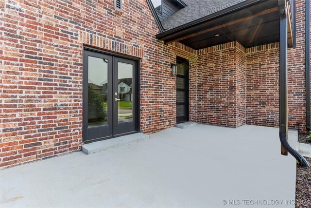 view of patio featuring french doors