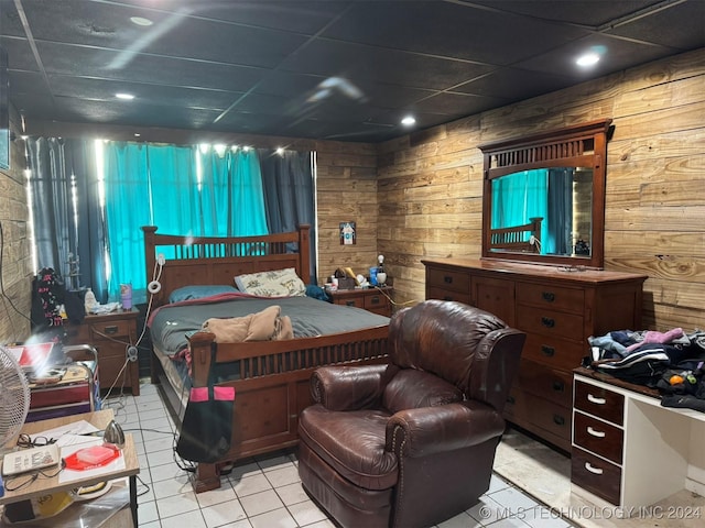 tiled bedroom with wood walls