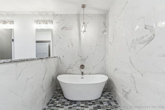 bathroom with a soaking tub and tile walls