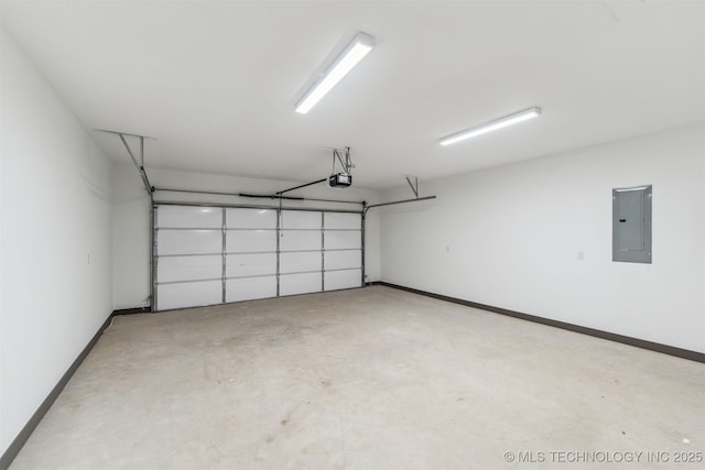 garage with electric panel, baseboards, and a garage door opener