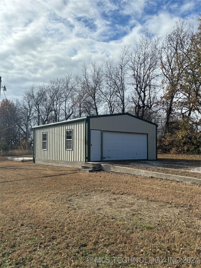 view of outbuilding with a garage