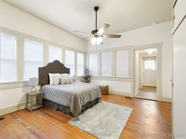 bedroom featuring ceiling fan and light wood-type flooring