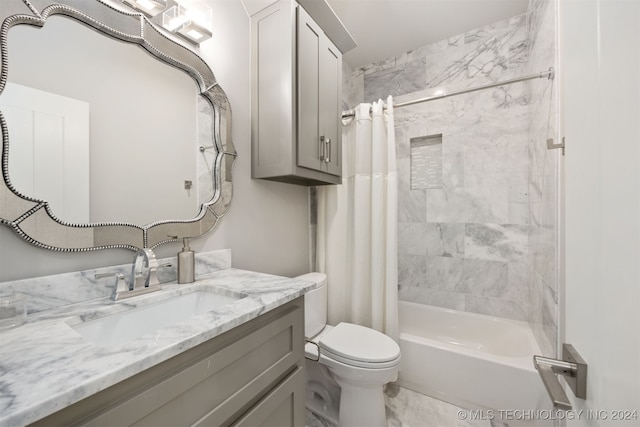 full bathroom featuring vanity, toilet, and shower / tub combo with curtain