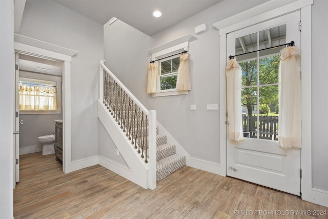 doorway to outside featuring light hardwood / wood-style flooring