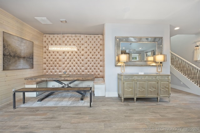 dining space with light hardwood / wood-style floors