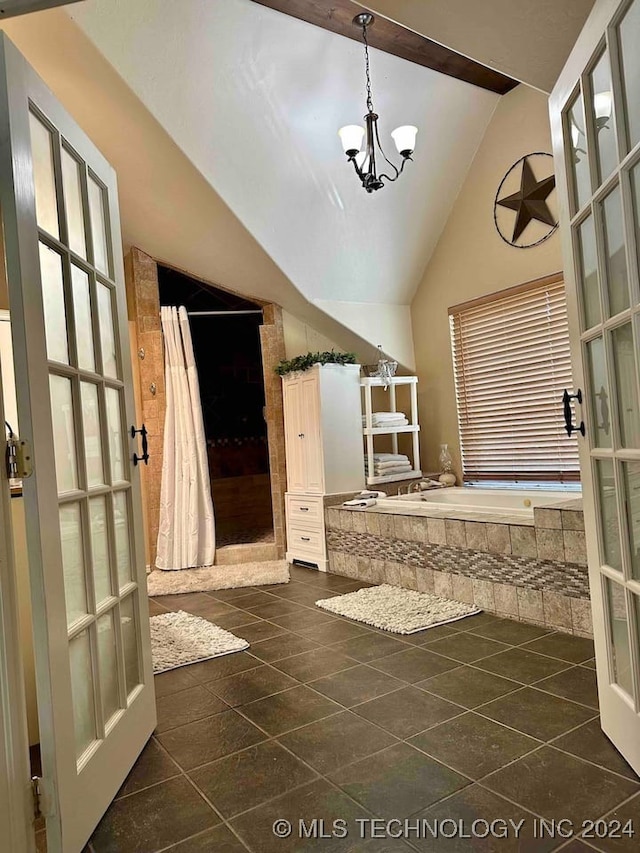 bathroom featuring a notable chandelier, shower with separate bathtub, high vaulted ceiling, beam ceiling, and tile patterned floors