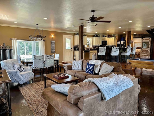 living room with ceiling fan, billiards, and crown molding