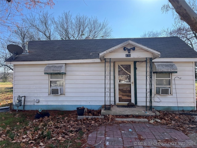 view of front of home with cooling unit