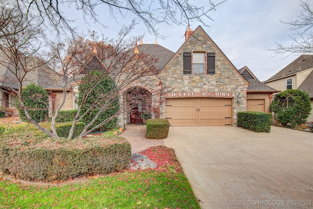 view of front of property featuring a garage