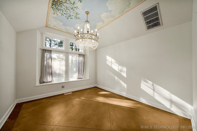 unfurnished dining area featuring a chandelier and lofted ceiling