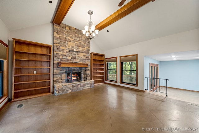 unfurnished living room featuring high vaulted ceiling, a stone fireplace, beamed ceiling, concrete flooring, and a chandelier