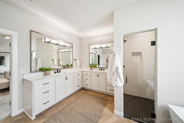 bathroom featuring vanity, parquet floors, and an enclosed shower