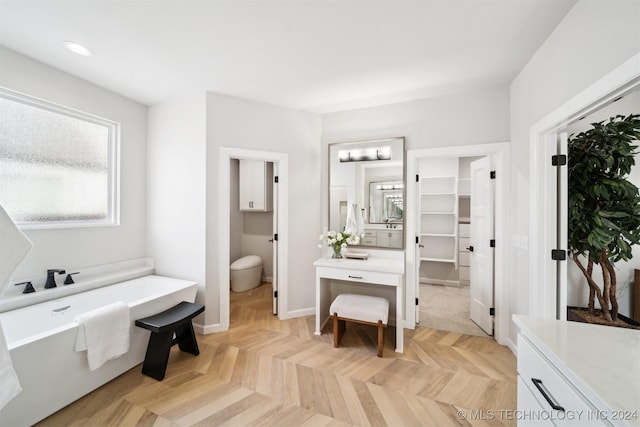 bathroom featuring vanity and a bathing tub