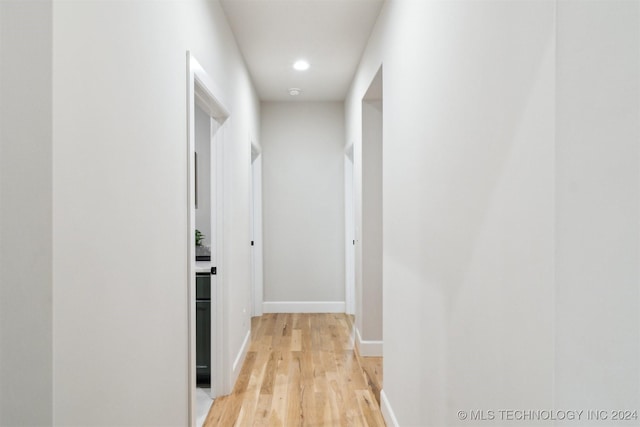 hallway featuring light hardwood / wood-style floors