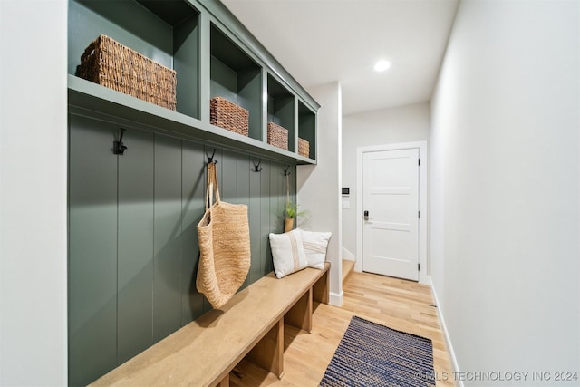 mudroom featuring wood-type flooring