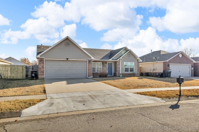 ranch-style home with a garage