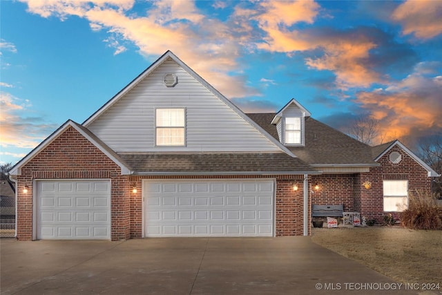 view of front of house with a garage