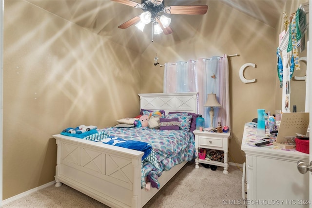 bedroom with vaulted ceiling, light colored carpet, and ceiling fan