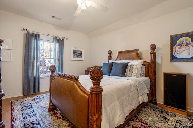 bedroom with hardwood / wood-style flooring and ceiling fan