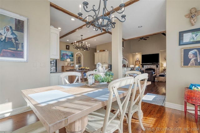 dining area featuring ceiling fan and dark hardwood / wood-style flooring