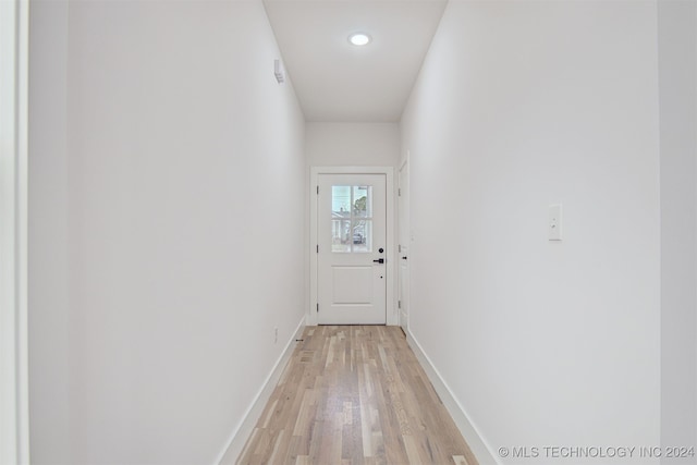 entryway with light hardwood / wood-style flooring