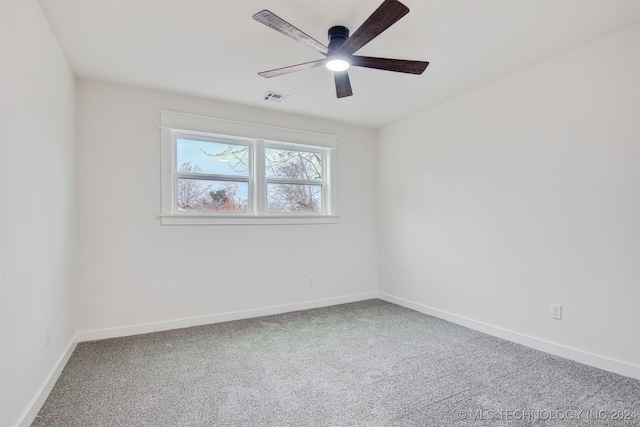 unfurnished room featuring carpet flooring and ceiling fan