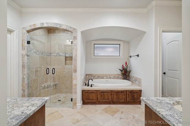 bathroom with tile patterned floors, vanity, ornamental molding, and shower with separate bathtub