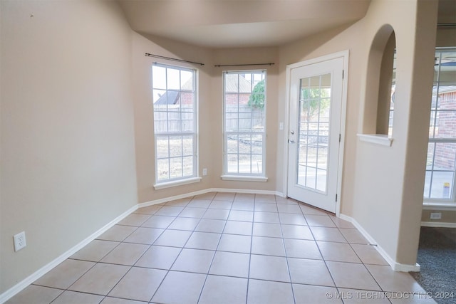 entryway featuring light tile patterned flooring