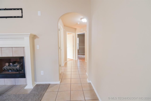 corridor with light tile patterned floors