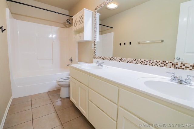 full bathroom with tile patterned flooring, shower / bathing tub combination, vanity, and toilet