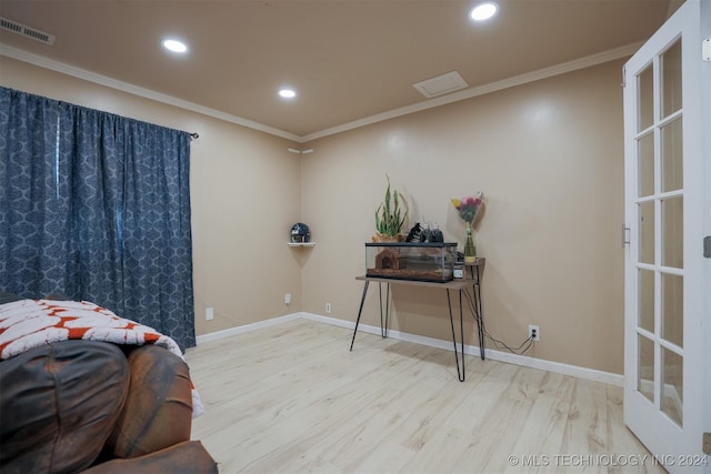 interior space featuring light hardwood / wood-style flooring and ornamental molding