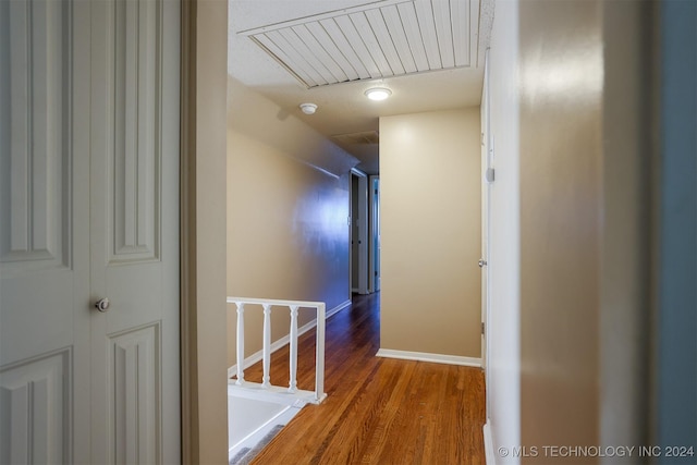 hallway featuring wood-type flooring